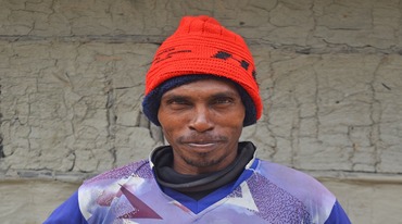 The Smile Beneath the Red Hat